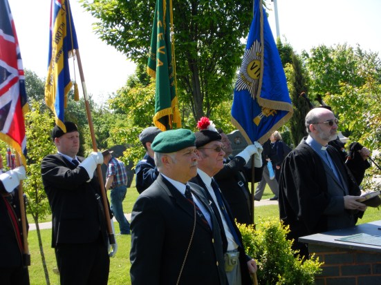 Padre Phill Wallace-Pugh takes The Drumhead Service, with the help of a retired RM Bugler, specially laid on.  